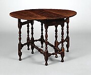 Oval table with falling leaves