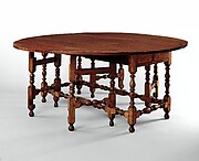 Oval table with falling leaves