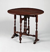 Oval table with falling leaves