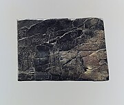 Plaque with tribute bearers