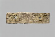 Plaque with kneeling ibexes flanking a central palmette