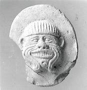 Plaque with face of the demon Humbaba
