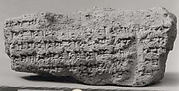Cuneiform cylinder: inscription of Nebuchadnezzar II describing work done on a wall and moat