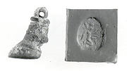 Bull's hoof stamp seal and modern impression: kneeling winged genius