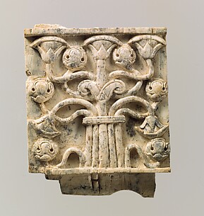 Plaque with a tree of intertwined papyrus and pomegranates; craftsman's mark on the lower tenon