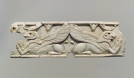 Plaque with reclining ram-headed sphinxes wearing the crown of Upper and Lower Egypt