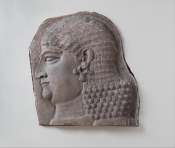 Head of a beardless royal attendant, possibly a eunuch