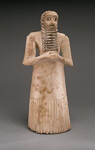 Standing male worshiper