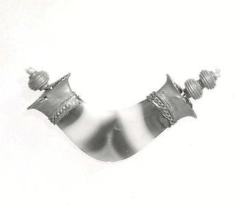 Part of a necklace: pendant and beads