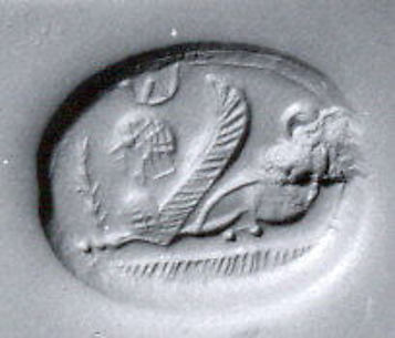 Scaraboid seal: seated sphinx wearing Egyptian-style crown