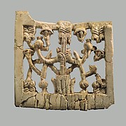 Openwork plaque with papyrus and pomegranates