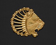 Applique in the shape of a lion's head