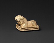 Brooch with a lion