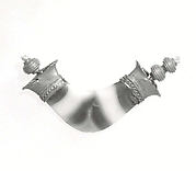 Part of a necklace: pendant and beads