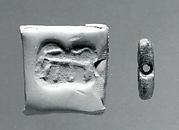 Rectangular plaque seal, indented at string holes