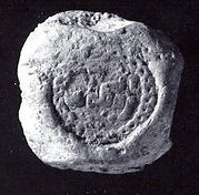Sealing with stamp seal impression: seated figure