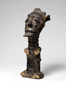 Memorial figure of a priest