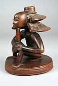 Headrest Base: Seated Female Figure