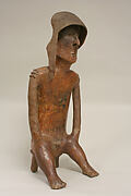 Male Figure on Stool