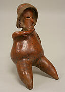 Figure on Stool