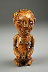 Pendant: Seated Female Figure