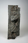 Plaque: Titleholder with Calabash Rattle