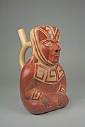 Stirrup spout bottle with dignitary figure