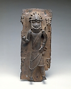Plaque: Titleholder with Calabash Rattle