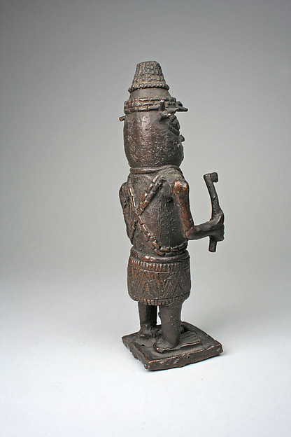 Figure: Court Official with Hammer and Staff