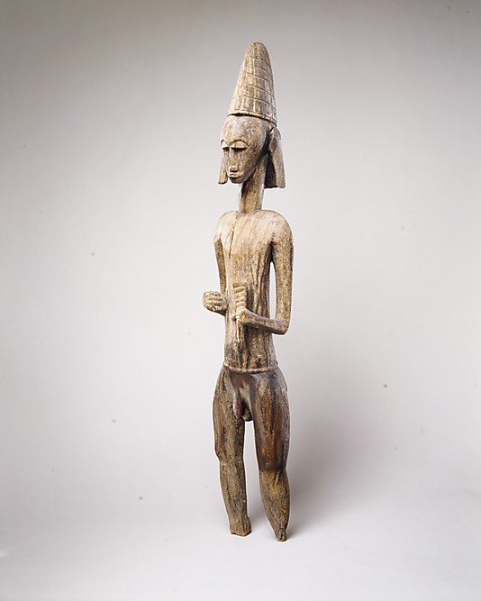 Male Figure Holding Animal Horn