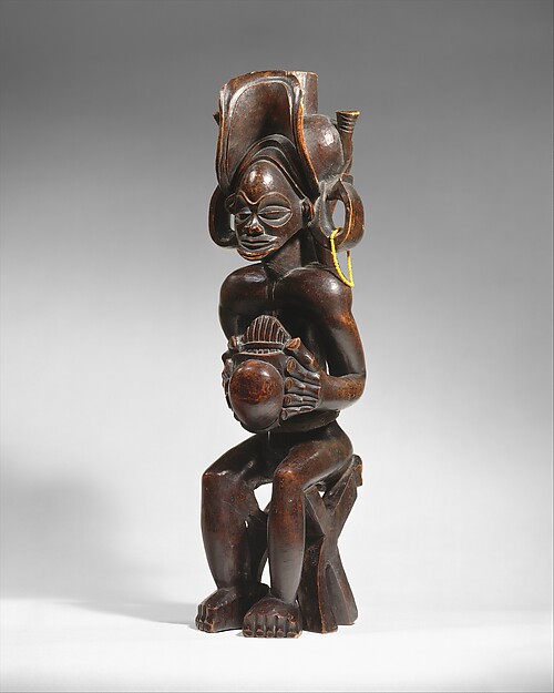 Seated Chief Playing Thumb Piano (Mwanangana)