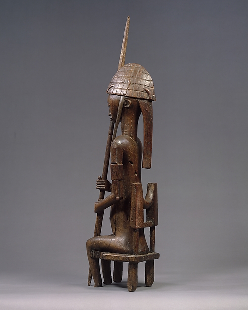 Seated Male Figure with Lance