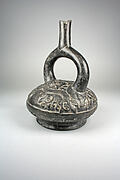 Stirrup Spout Bottle with Fanged Deity