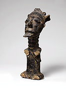 Memorial figure of a priest