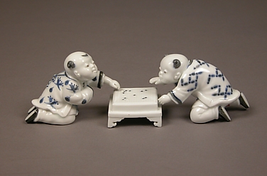 Chinese Child Playing a Game of Go