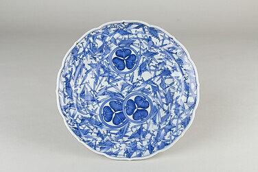 Dish with Design of Rafts, Oars, Caps, and Tokugawa Family Crest of Hollyhocks
