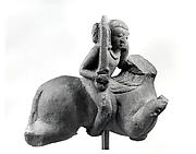 Figure Riding a Horse