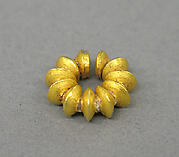 Ear Clip Composed of Fused Discs