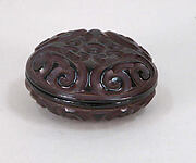 Box with Pommel Scroll Design