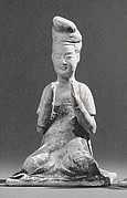 Seated Female Musician