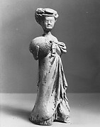Female Attendant Carrying a Pillow