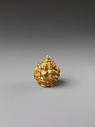 Rod Finial Clip with Deity Surrounded By  Sekti Motif