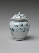 Jar and Lid with Flowering Plant