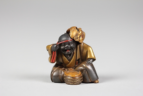 Netsuke of Boy with a Mask