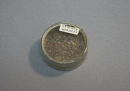 Container of Crushed Garnets