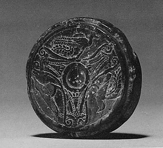 Disk Stone with a Three-Part Design of Palmettes and Birds