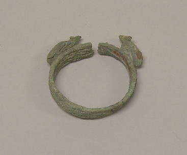 Wide Bracelet with Facing Animals(?)