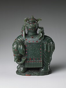 Elephant Carrying a Vase
