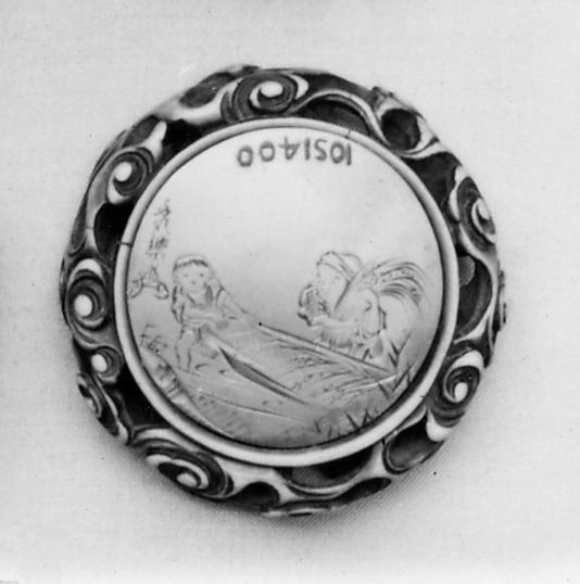 Netsuke of Peasant and Child Loading a Boat