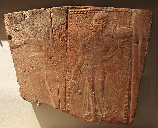 Tile Showing a Woman Carrying a Pot